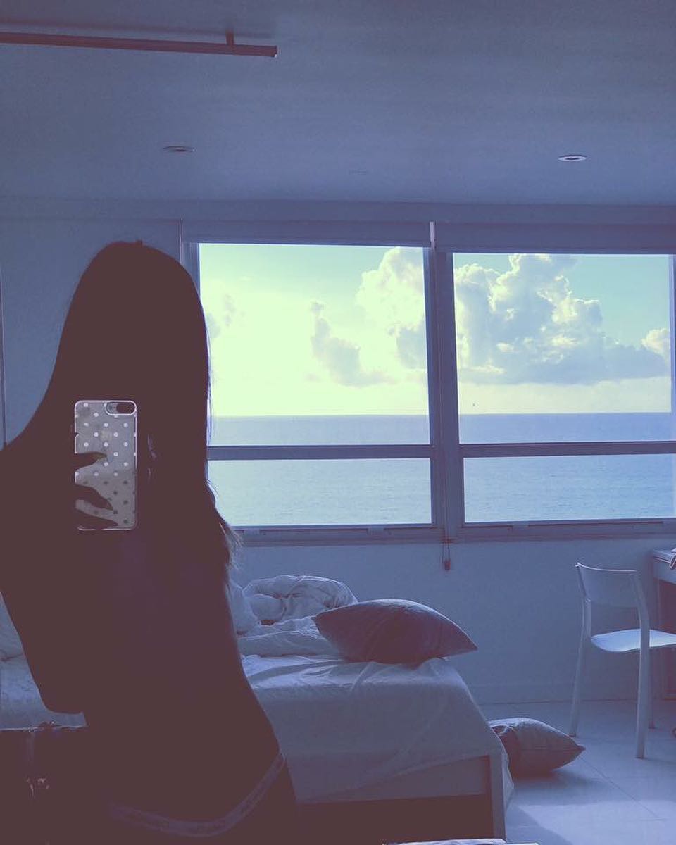 Korra Del Rio backlit selfie on vacation