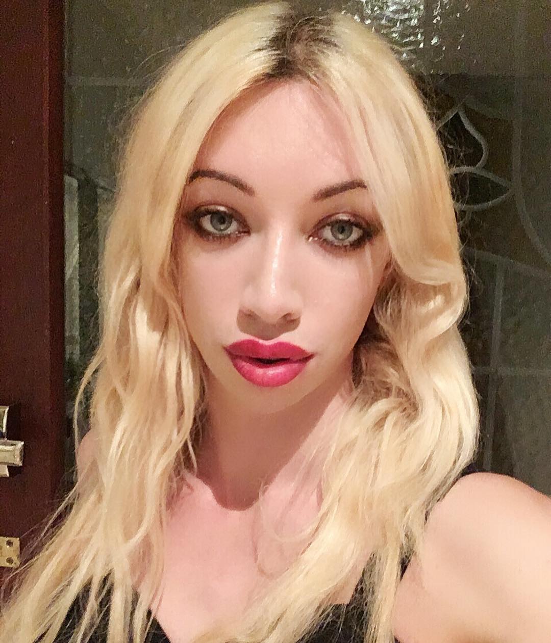Sasha De Sade red lips selfie