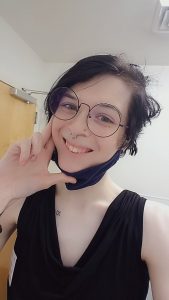 Nonbinary goth beauty Autumn smiling selfie