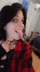 Nonbinary trans with long tongue selfie