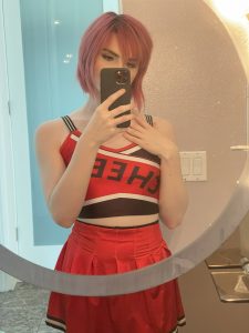 Redhead trans cheerleader bathroom selfie Ella Hollywood