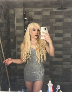 Blonde Saray Doll dressed to kill in cocktail dress